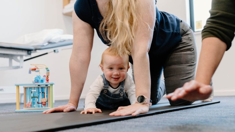 Woman returning to exercise safely after giving birth