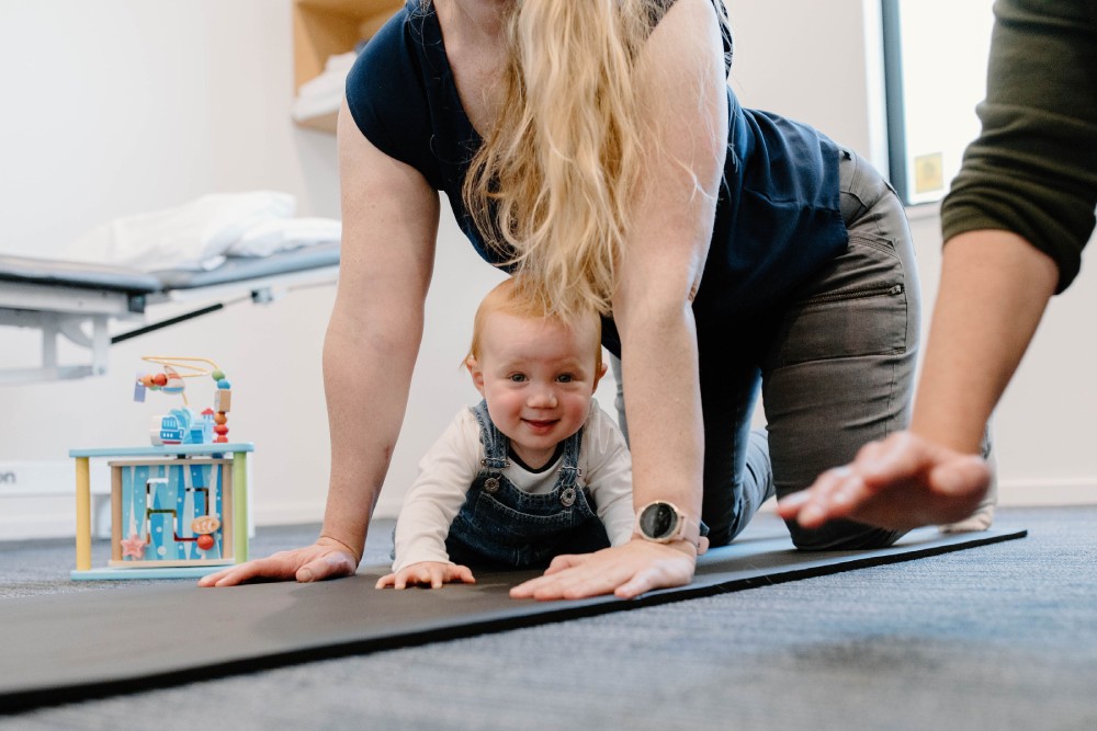 Woman returning to exercise safely after giving birth