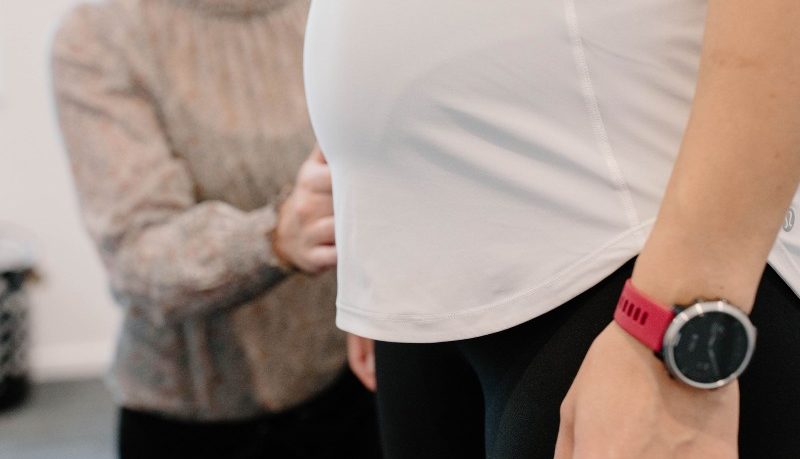 Woman getting pregnancy related pelvic girdle pain assessment and relief